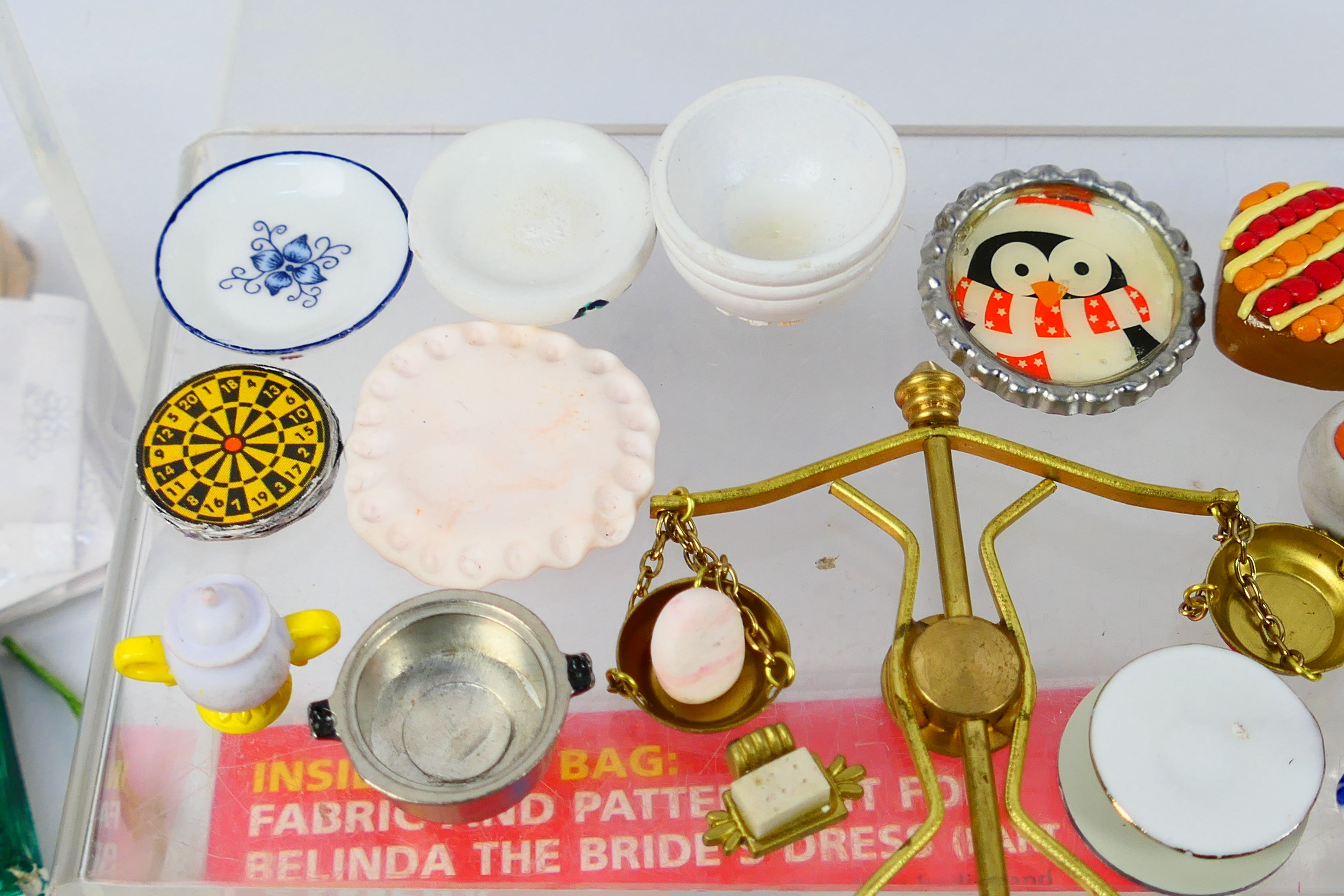 A collection of dolls house accessories and furniture to include chairs, table, ceramic tea set, - Image 5 of 9