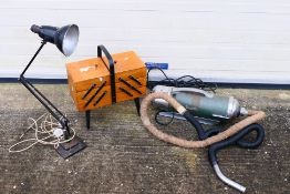 A vintage Vactric vacuum cleaner, an Anglepoise style lamp and a sewing box. [2].