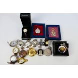 A collection of modern pocket watches, part boxed, and two wrist watches.