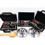 Automotive tool kits including one Jaguar example, two vintage Jaguar hub caps and other.