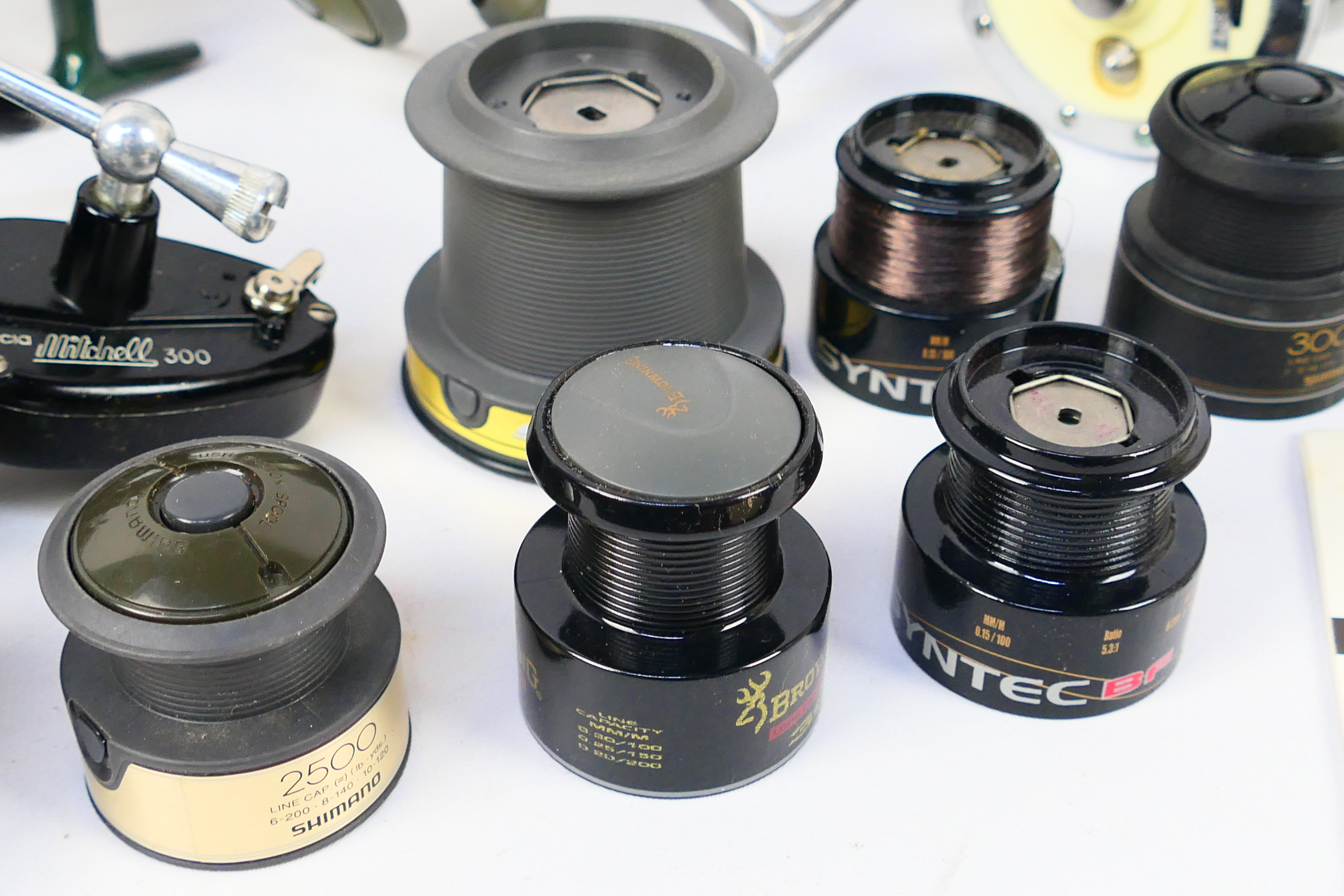 Six reels and a quantity of spare spools to include a Mitchell 624, a Mitchell 300, Surf Master, - Image 9 of 11