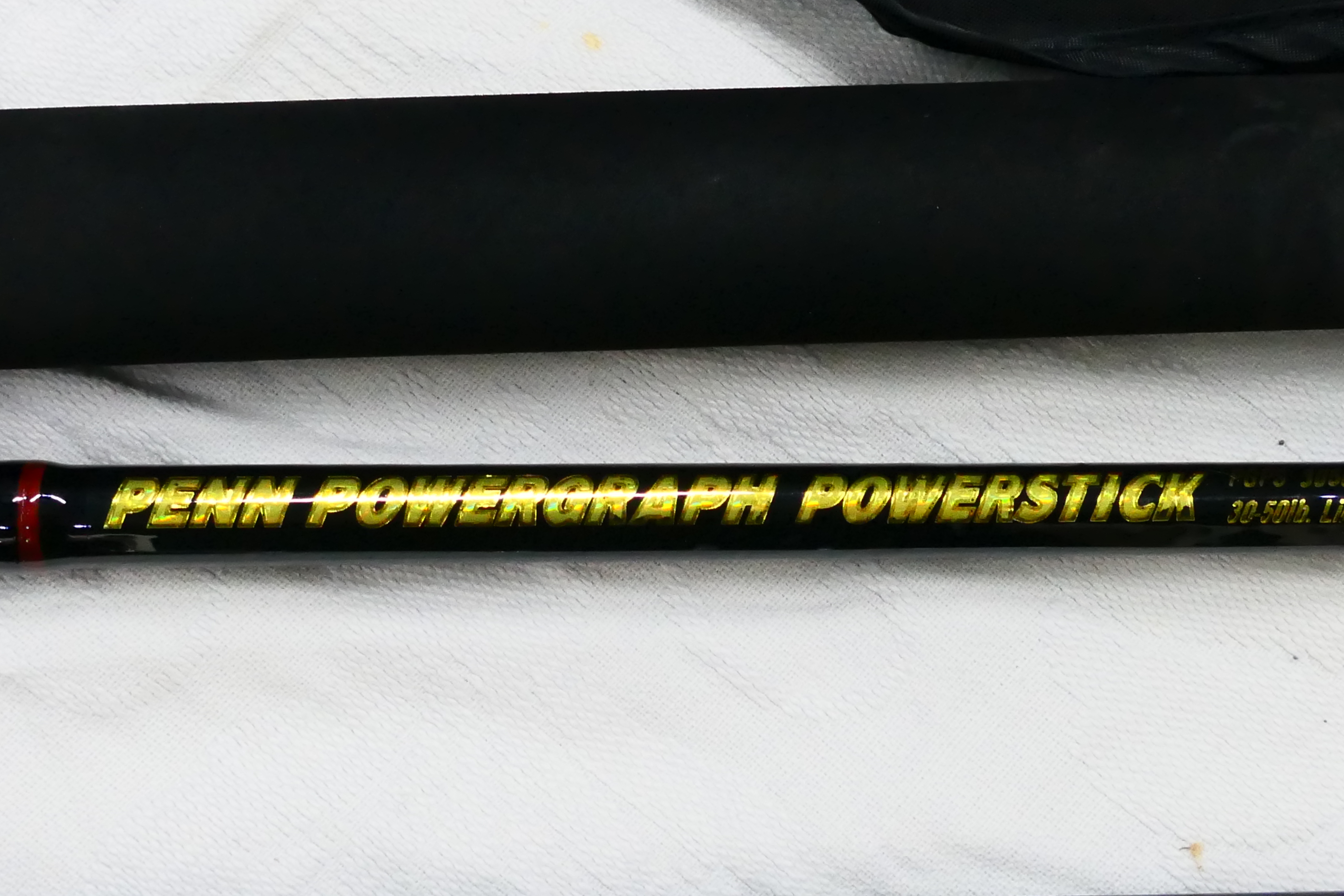 Two rods comprising a two piece Penn Powergraph Powerstick 30 - 50lb line and a two piece Grauvell - Image 10 of 16