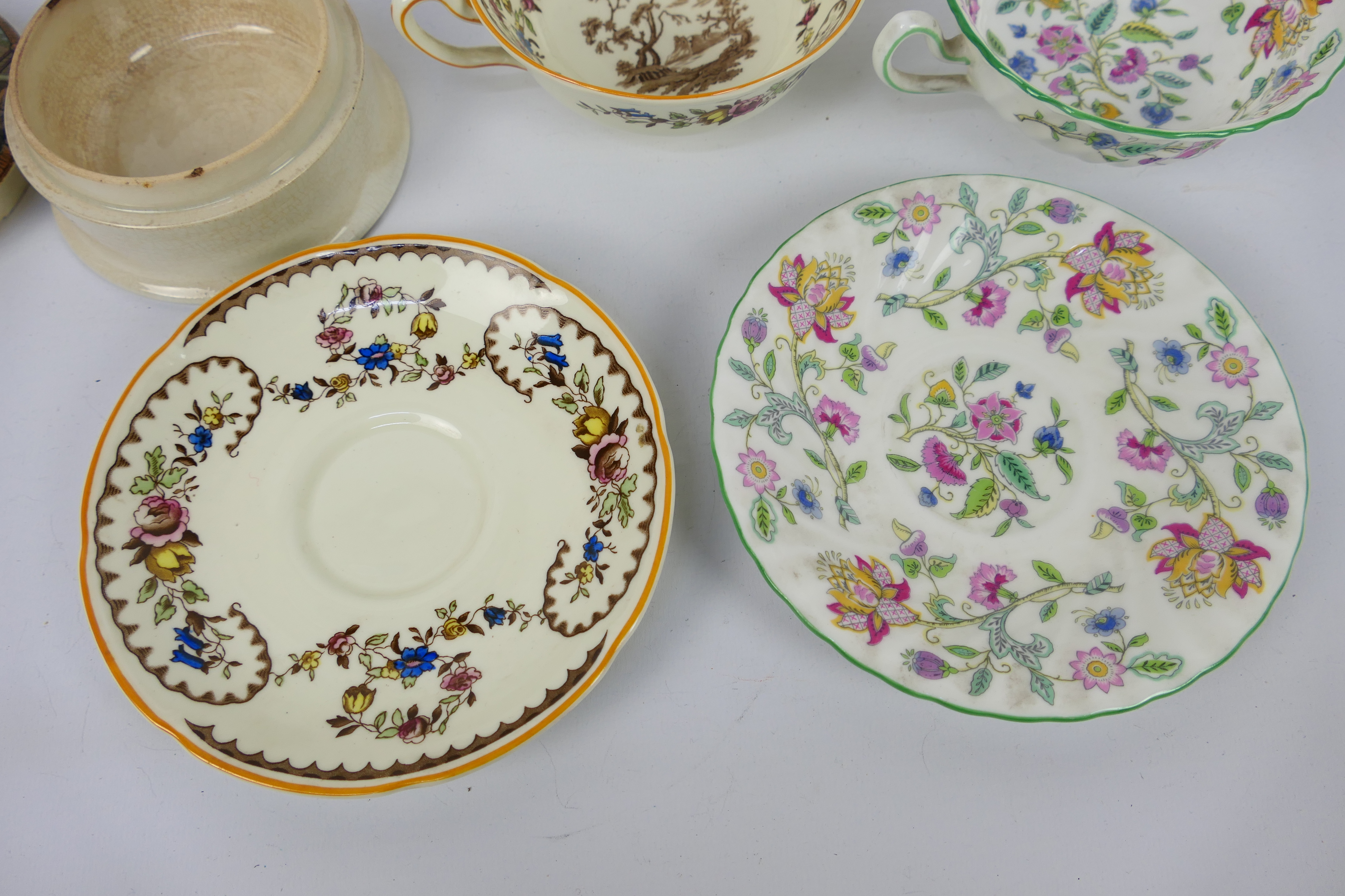 A 19th century Prattware paste pot The Travellers Rest and two soup bowls and saucers, - Image 3 of 6