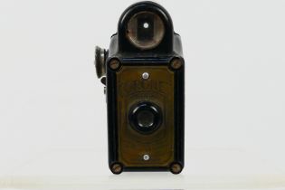 A Coronet Midget 16 mm subminiature camera, black bakelite case, 6.5 cm (h).