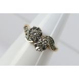 A 9ct yellow gold, illusion set diamond ring having approximately 20 pts of diamonds, size O,