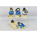 Coalport - Five Paddington Bear figures comprising Eats An Apple, The Chimney Sweep,