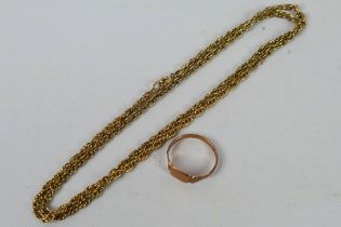 A rose gold ring (hallmarks very rubbed but presumed 9ct) and an unmarked yellow metal chain,