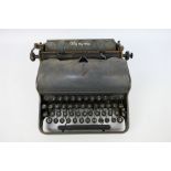 A World War Two (WW2 /WWII) German Olympia Robust portable typewriter,