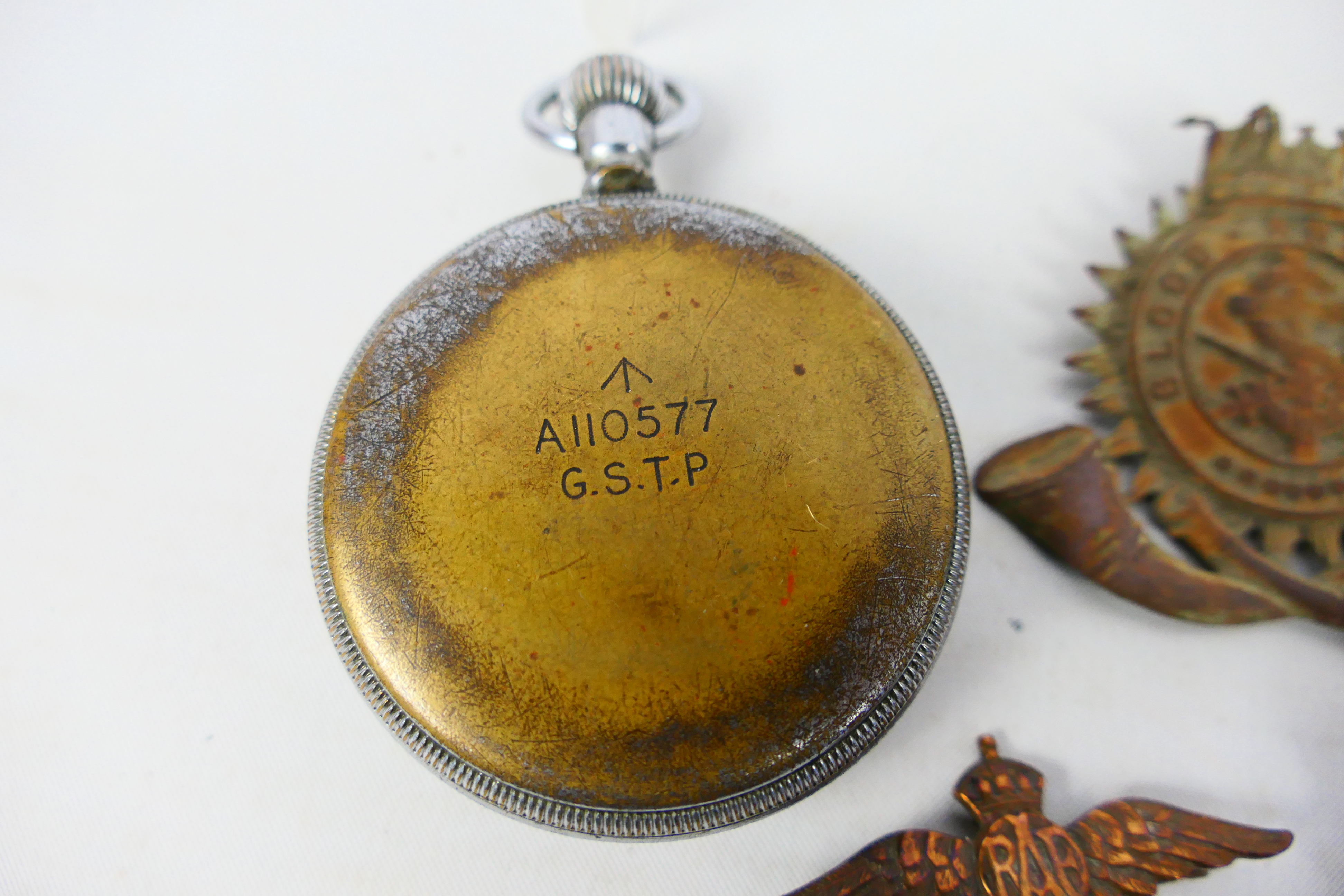 Lot to include various cap badges, General Service Trade Pattern pocket watch, - Image 7 of 11