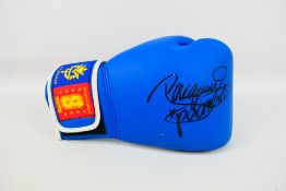 Boxing Interest - A blue right hand boxing glove signed by Manny 'Pacman' Paquiao (Emmanuel