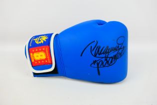 Boxing Interest - A blue right hand boxing glove signed by Manny 'Pacman' Paquiao (Emmanuel