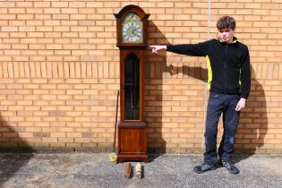 An early 20th century, oak cased grandmother clock, glazed door,