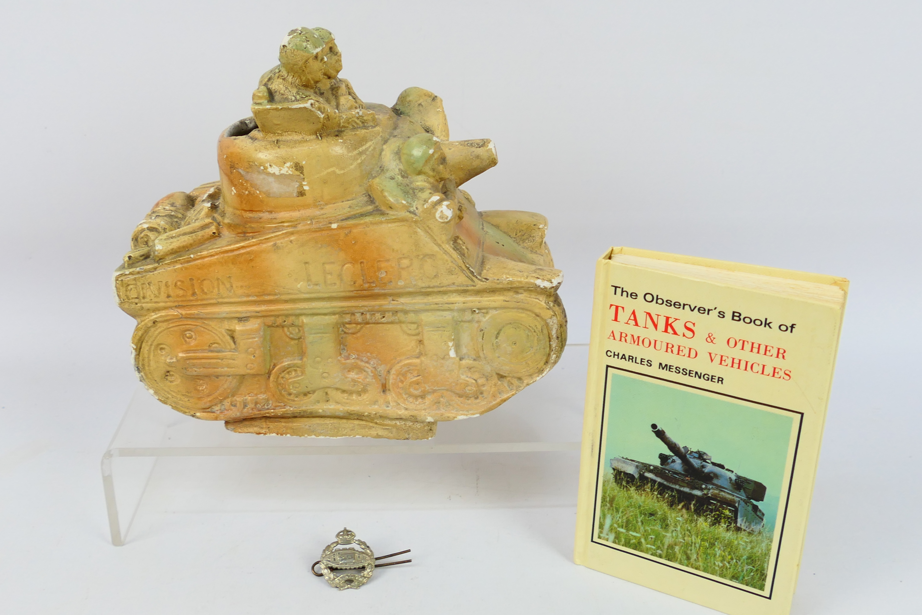 A ceramic model depicting a stylised French tank,