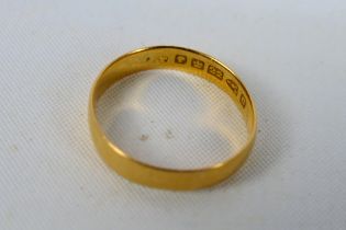 A Victorian 22ct yellow gold wedding band, Chester assay 1886, size L, 2.1 grams.