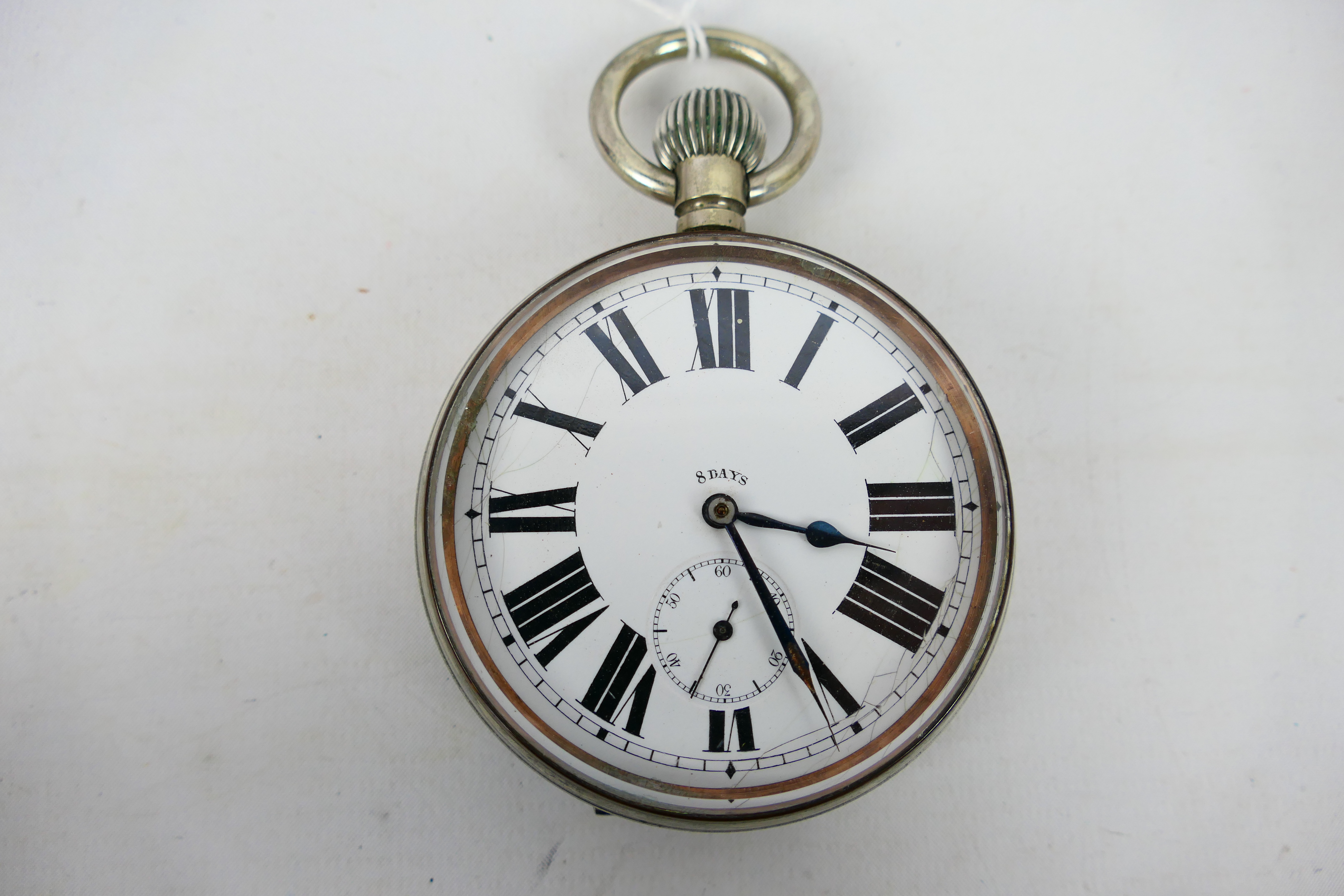 A nickel plated Goliath 8 day pocket watch, Roman numerals to a white enamel dial, - Image 3 of 6