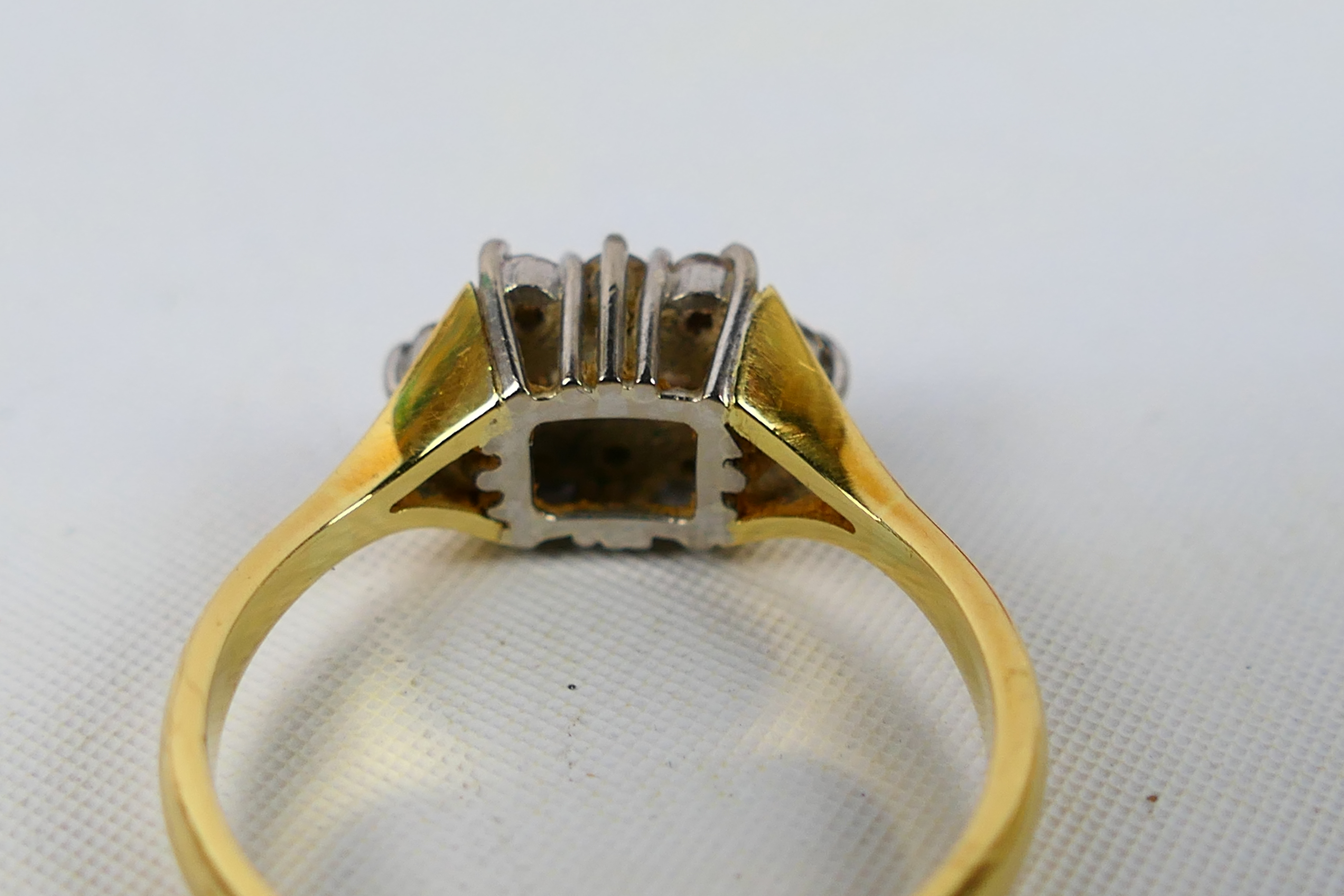 A gold and diamond cluster ring centrally set with four old cut diamonds, - Image 3 of 5