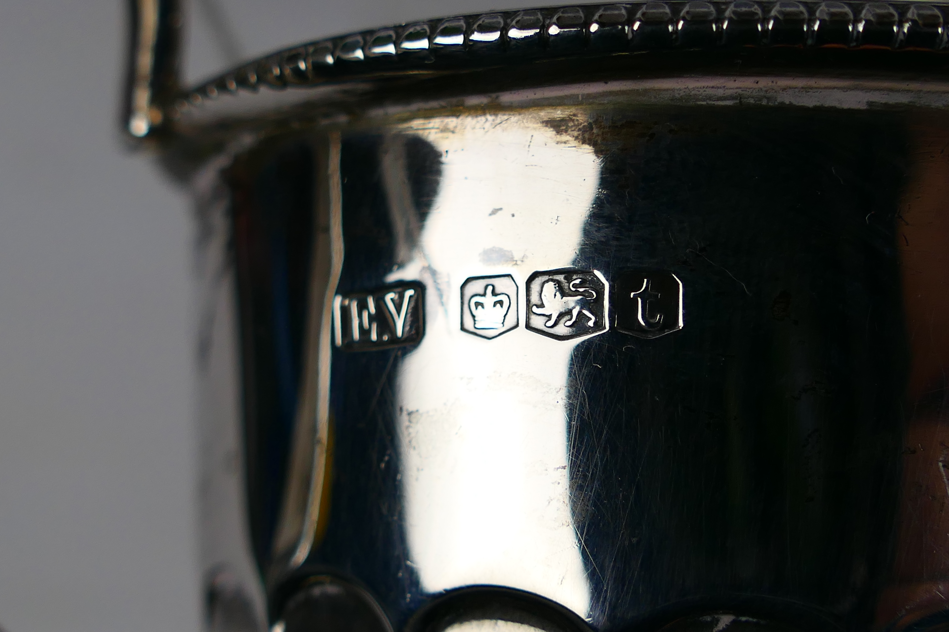A silver tea service comprising teapot, sugar bowl and milk jug, Sheffield assay 1936, - Image 6 of 8