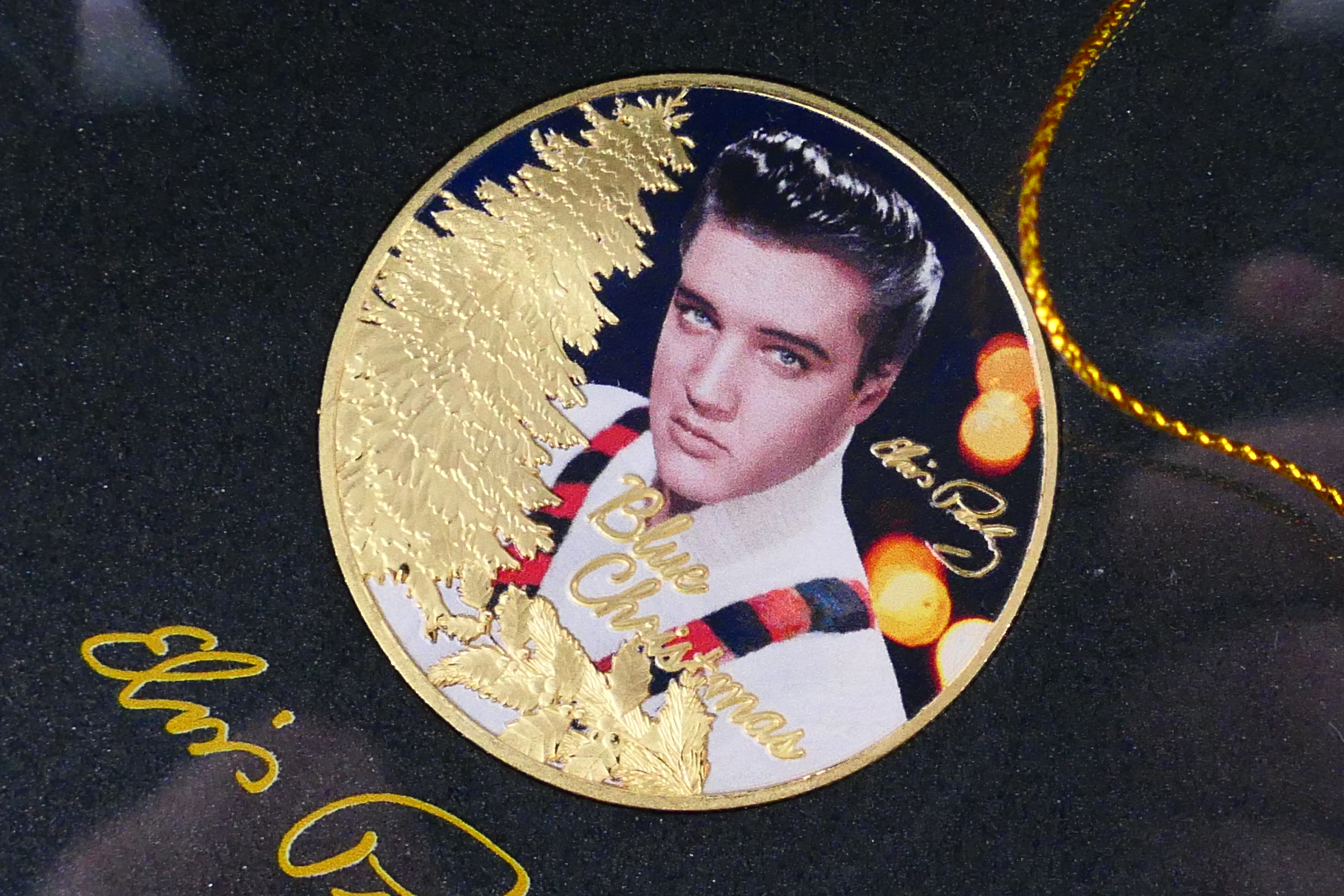 Elvis Presley - Four Elvis related commemorative coins comprising a 1/10 oz 24ct gold proof Blue - Image 3 of 6