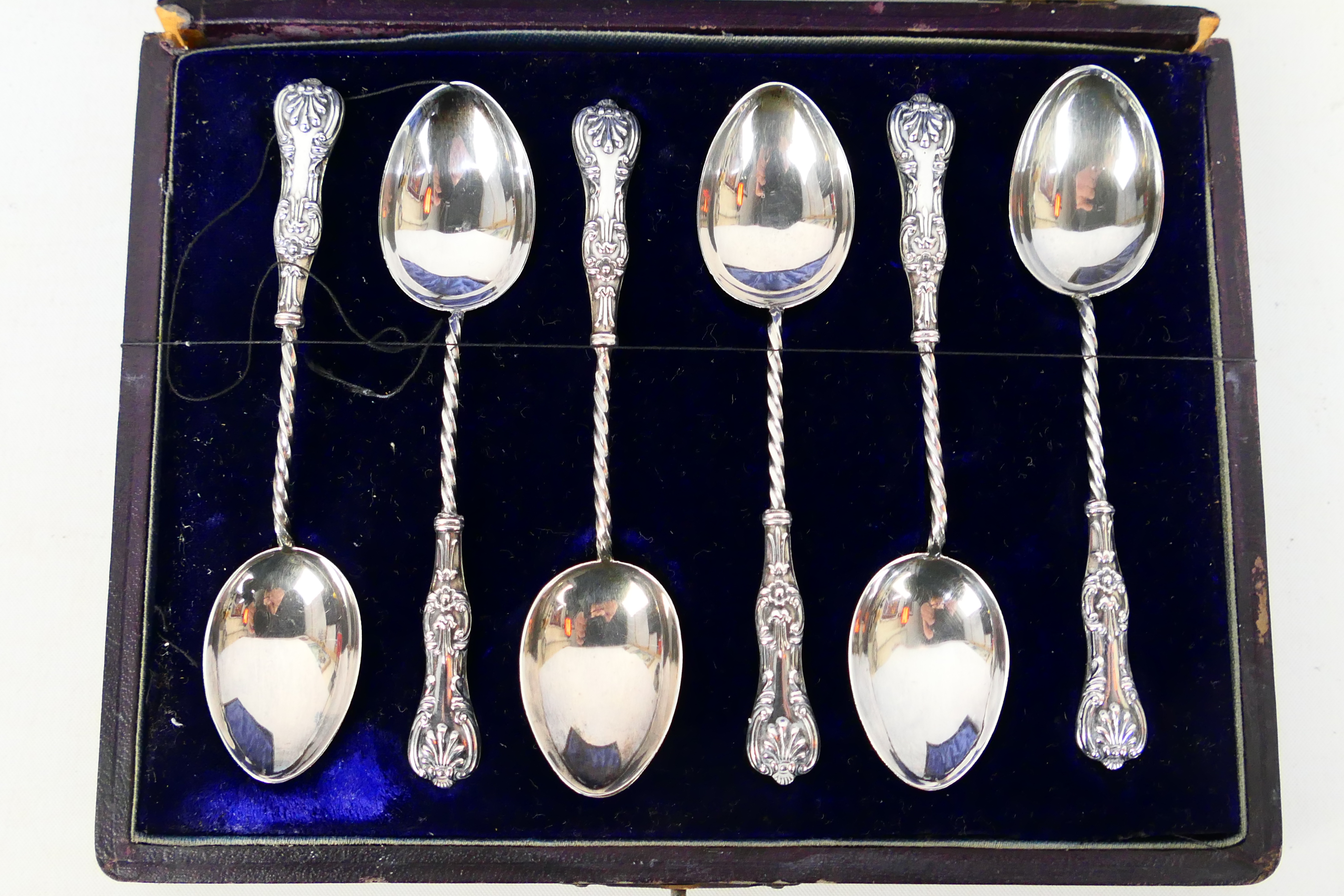 A cased set of six Edwardian coffee spoons with embossed handles and twist stems, - Image 2 of 5