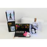 Elvis - Lot to include an Elvis purse by Moda, an Elvis napkin holder and bottle light, all boxed.
