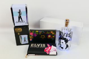 Elvis - Lot to include an Elvis purse by Moda, an Elvis napkin holder and bottle light, all boxed.