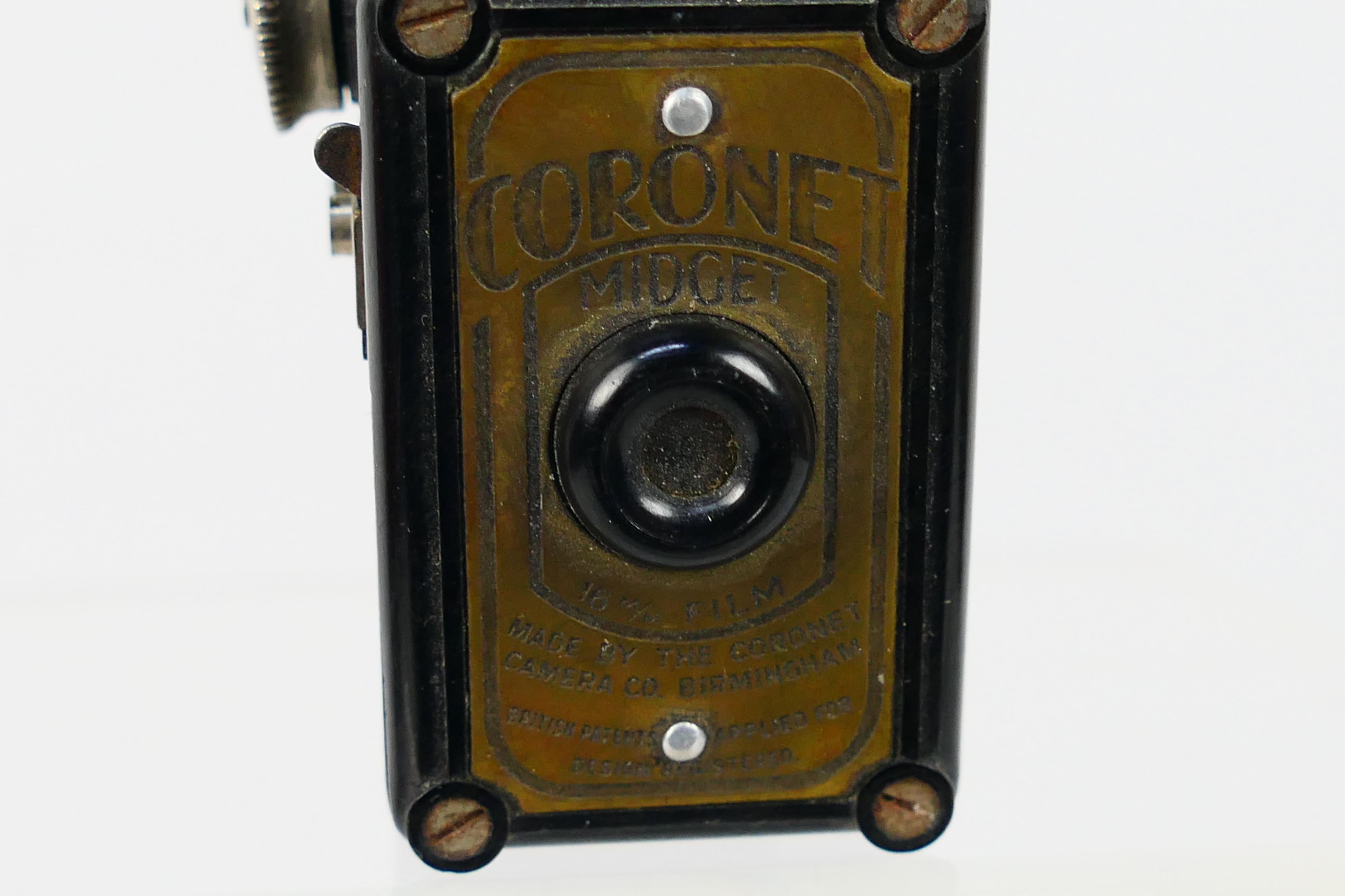 A Coronet Midget 16 mm subminiature camera, black bakelite case, 6.5 cm (h). - Image 2 of 6