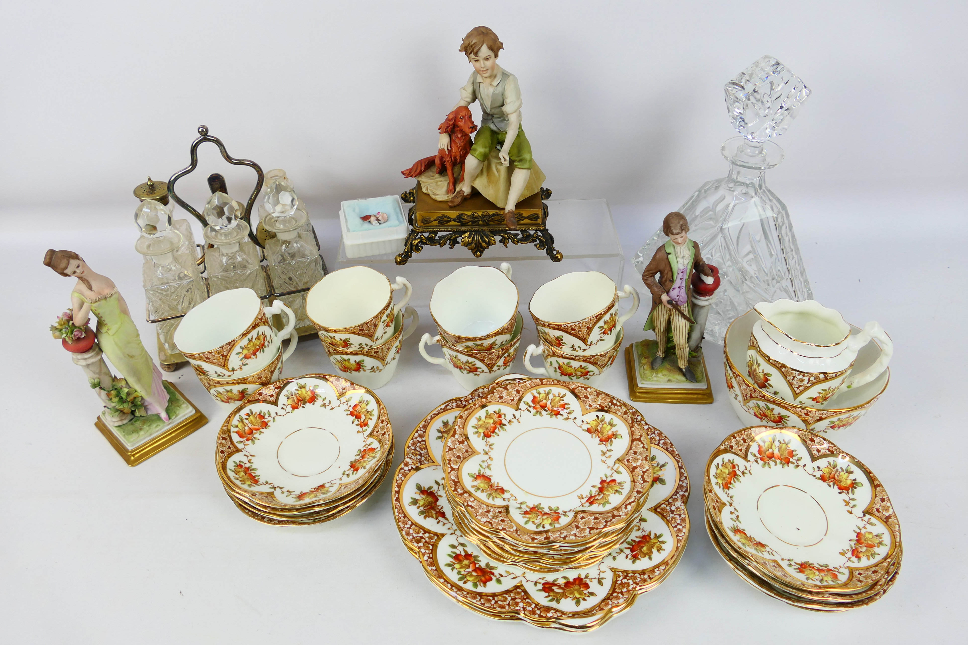 Lot to include late 19th or early 20th century tea wares, decanter, cruet set, Capodimonte figures.