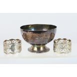 A small silver footed bowl, Birmingham assay and two late Victorian silver napkin rings,