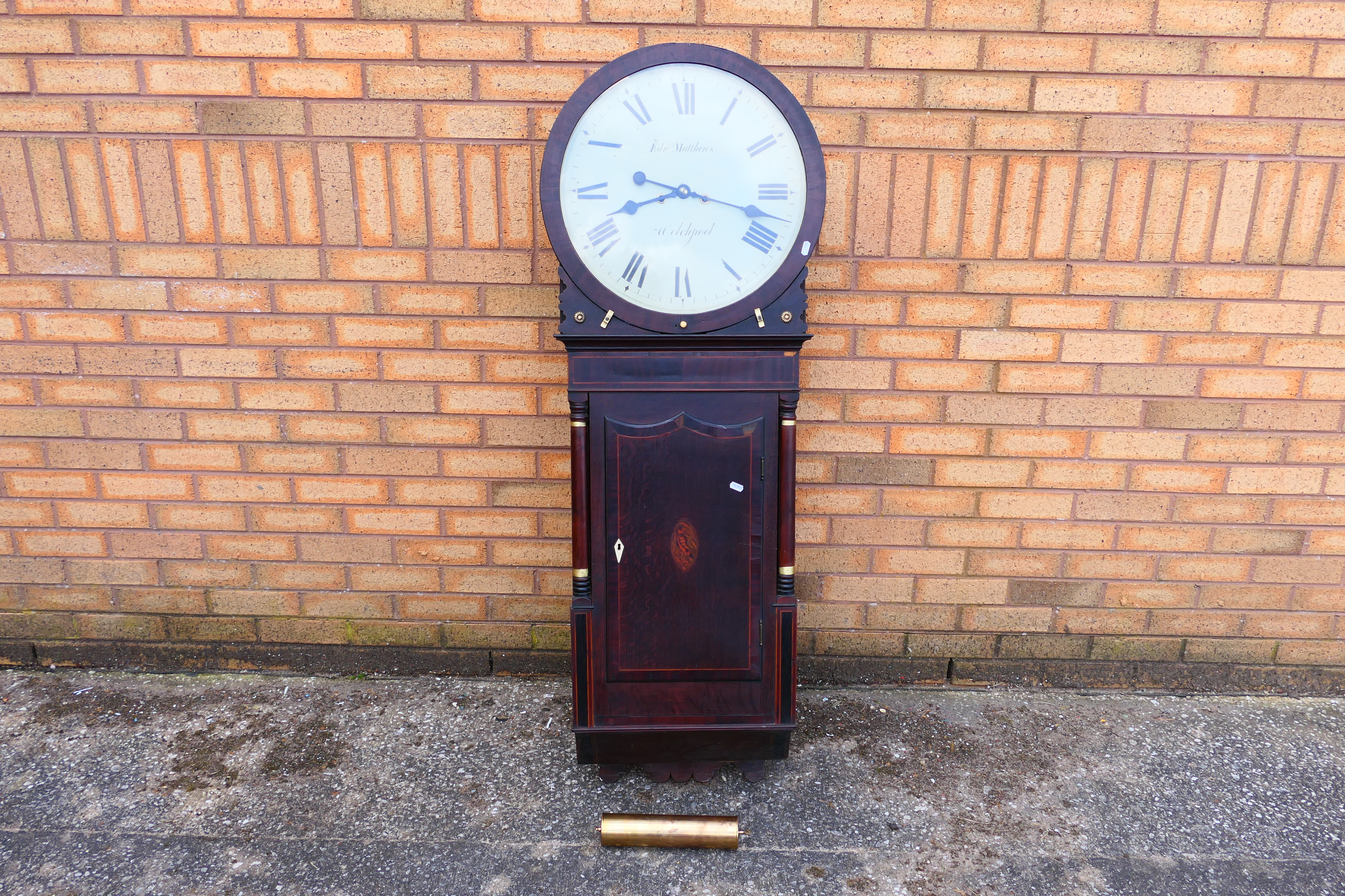 An early 19th century tavern style wall clock, painted dial signed Richard Mathews, Welshpool,