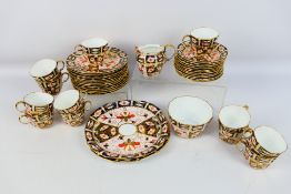 Royal Crown Derby - A collection of Imari pattern table wares, 2451,
