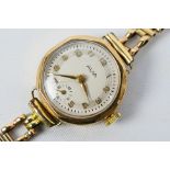A lady's 9ct yellow gold cased Avia wrist watch on 9ct gold bracelet, approximately 8.