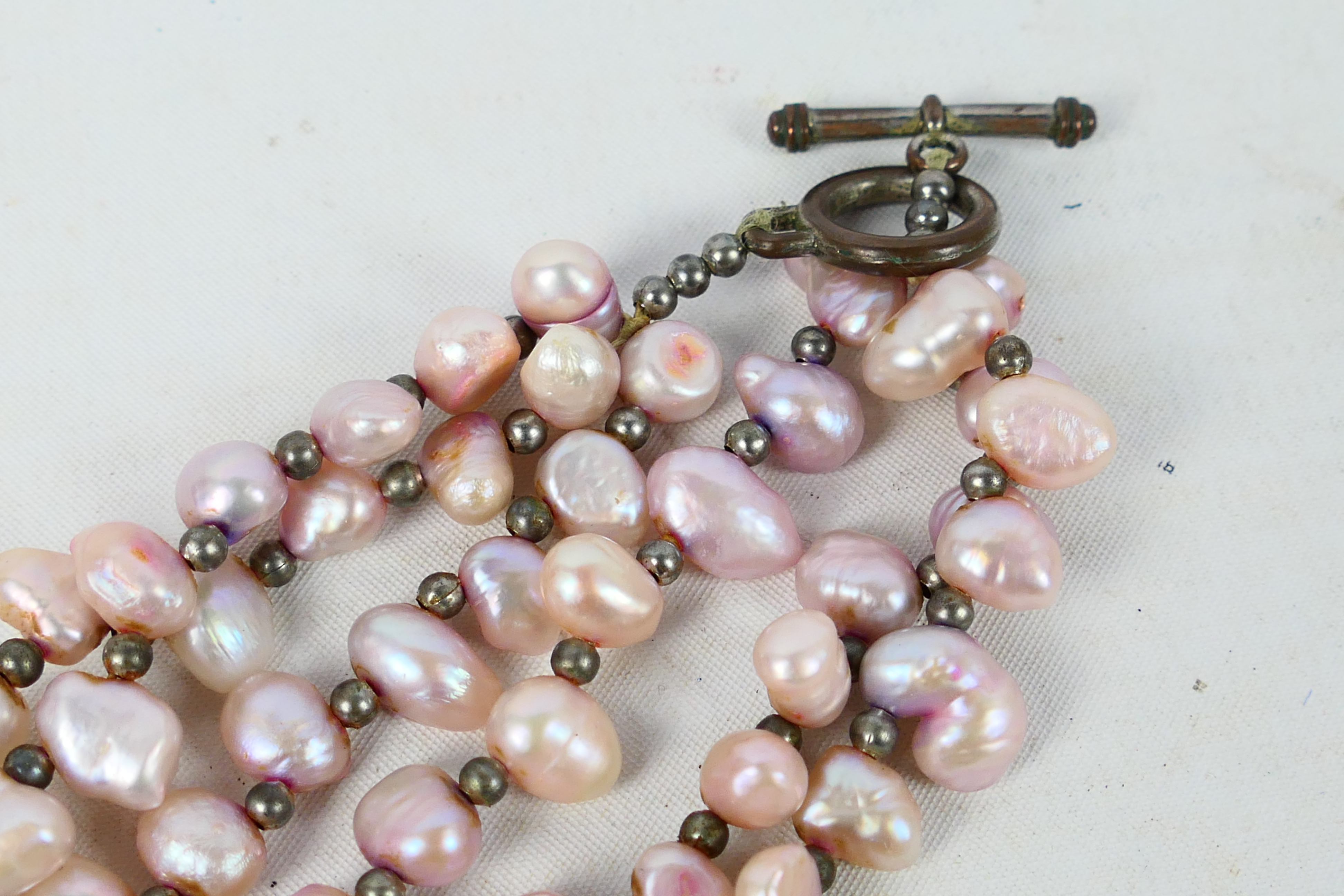 A rice pearl necklace with clasp stamped 9ct (in need of restringing) and a pearl bead three strand - Image 4 of 6