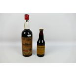A bottle of G & J Greenall Top Dog Fine Old Demerara Rum, no strength or capacity stated,