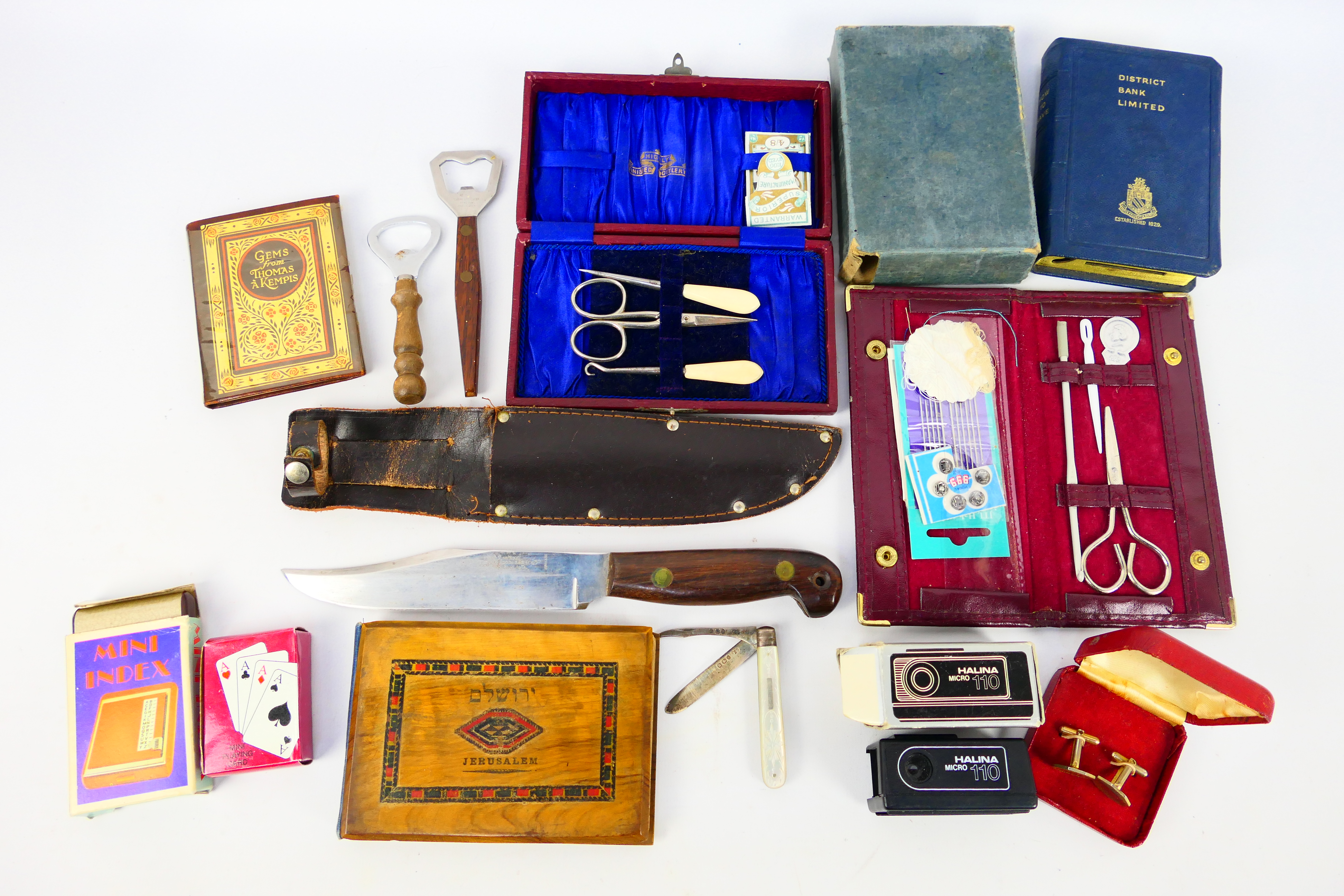 A mixed lot of collectables to include a Bowie type knife, boxed Halina Micro 110 miniature camera,