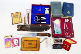 A mixed lot of collectables to include a Bowie type knife, boxed Halina Micro 110 miniature camera,