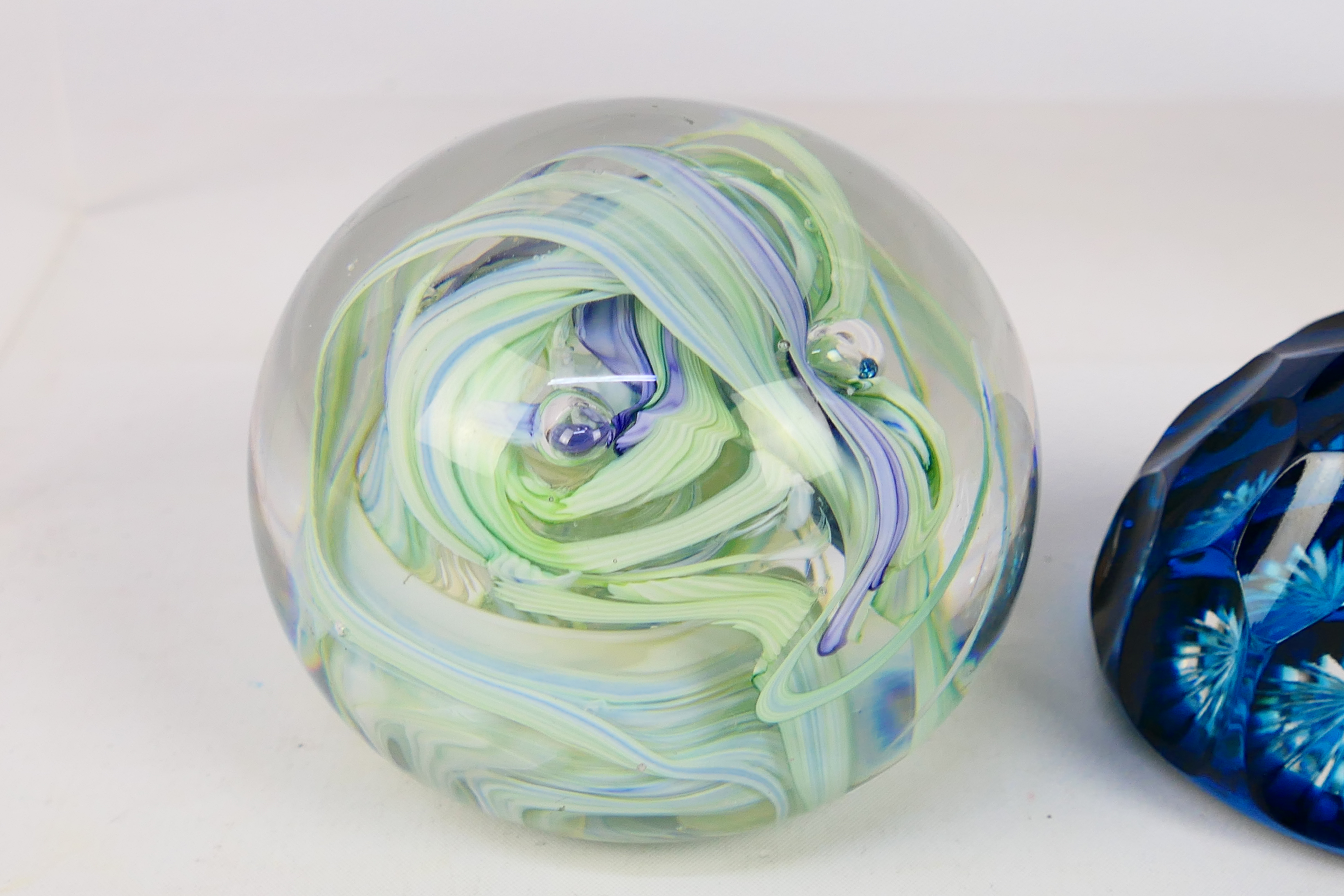 Four decorative paperweights, one with faceted blue glass, Caithness style and similar. - Image 4 of 5