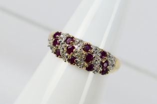 A 9ct yellow gold, diamond and ruby ring, size O+½, approximately 2.6 grams.
