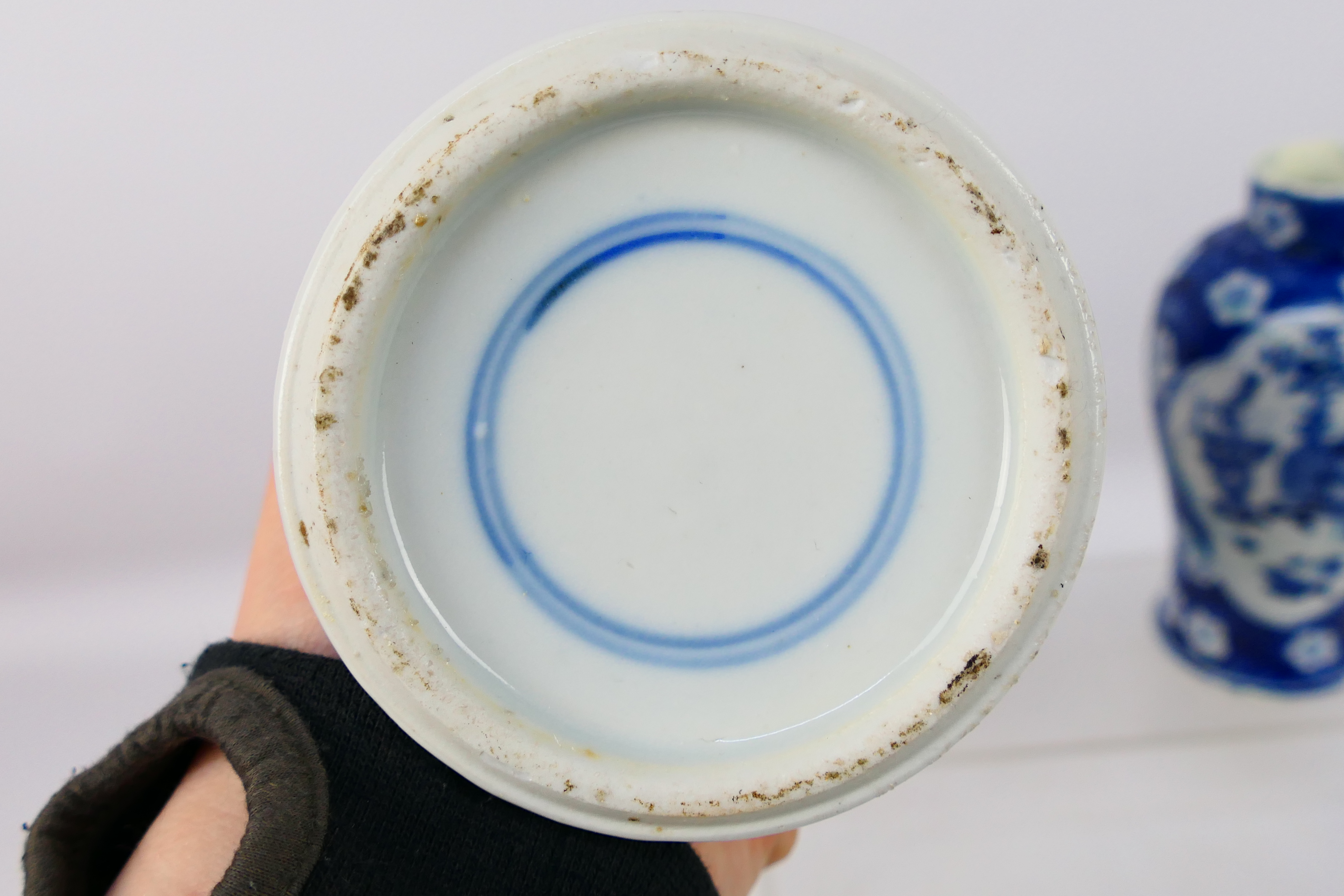 A Chinese blue and white jar and cover, decorated with prunus, - Image 11 of 23