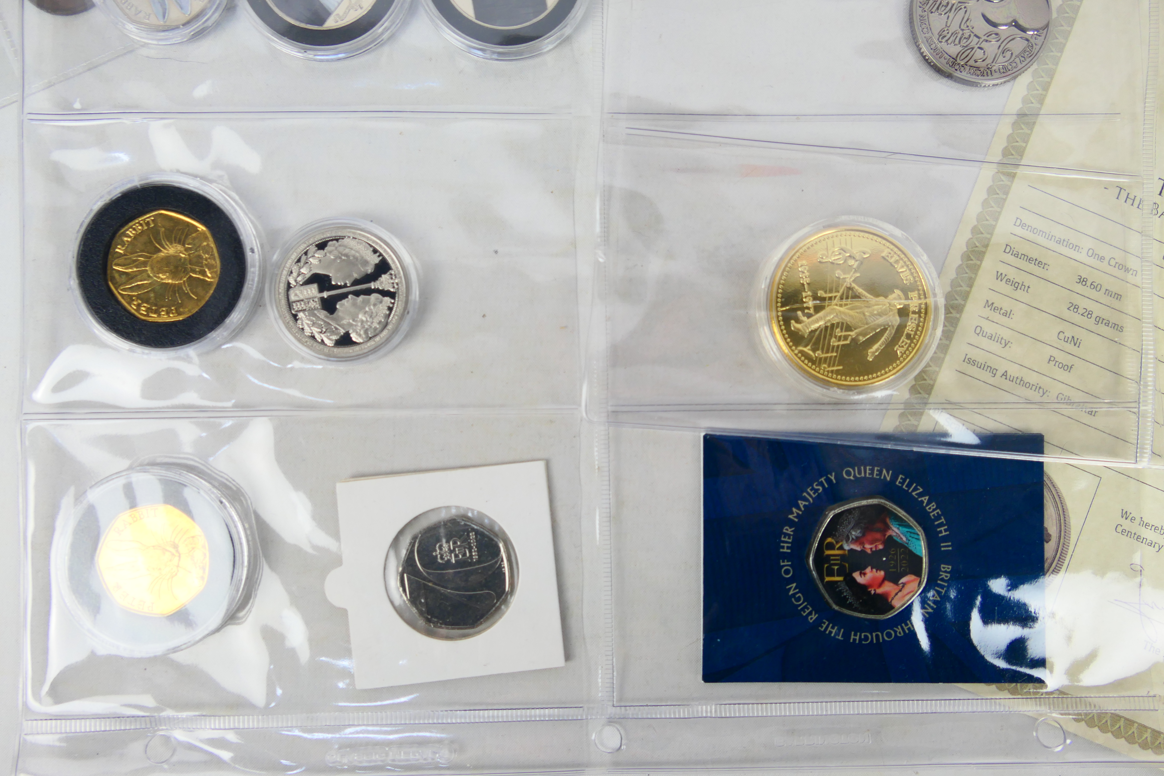 A collection of UK and foreign coins to include collectable fifty pence (50p) examples and other. - Image 2 of 10