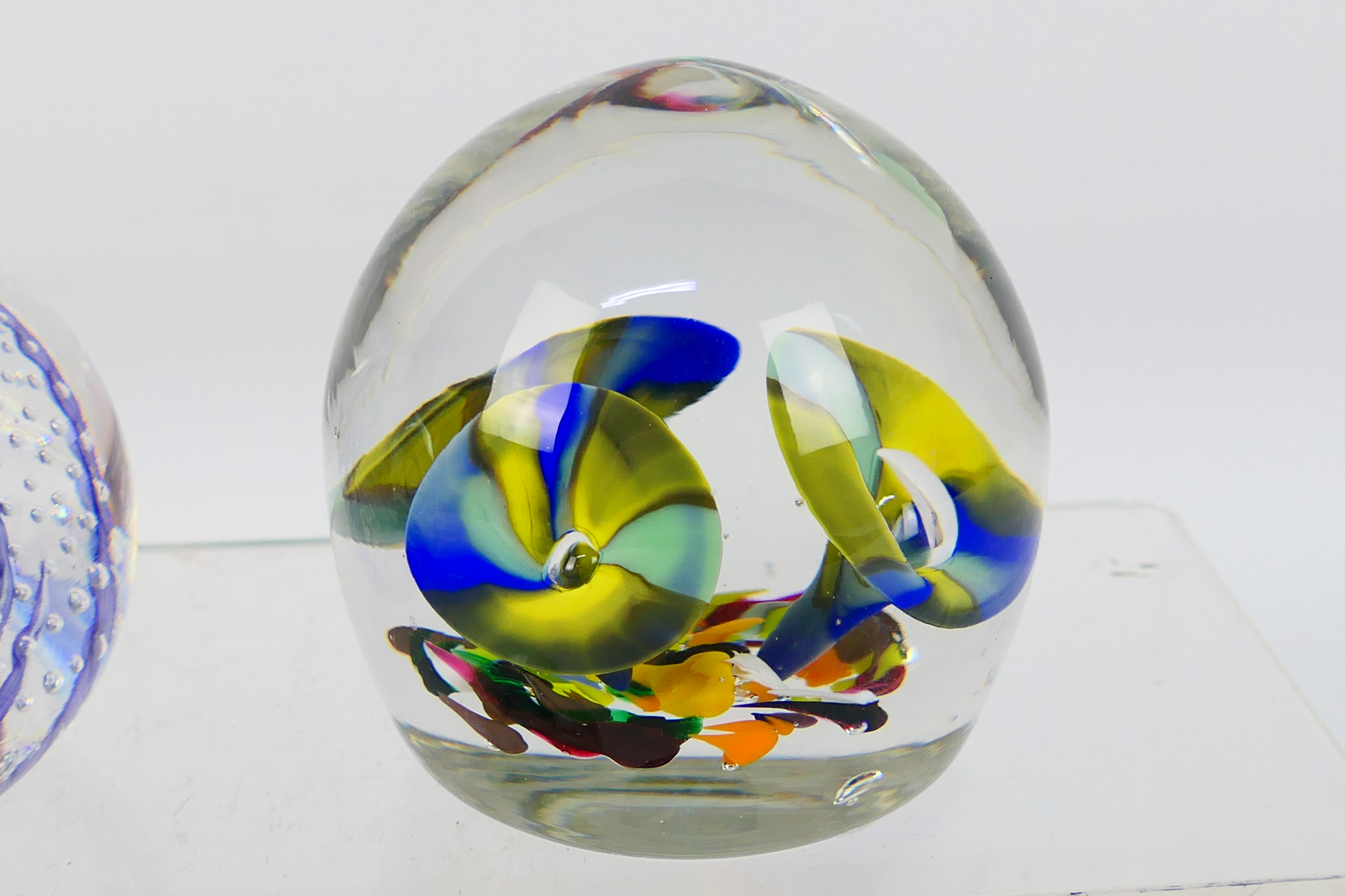 Four decorative paperweights, one with faceted blue glass, Caithness style and similar. - Image 3 of 5