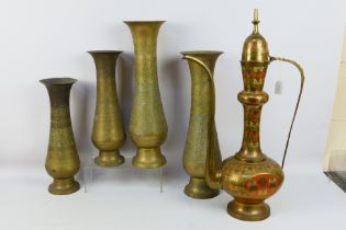 Lot to include four large brass vases with chased decoration,