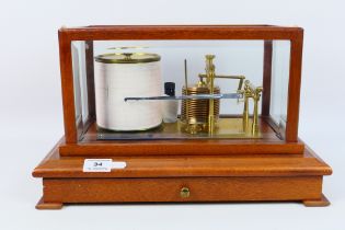 A late 20th century mahogany cased barograph with fourteen tier vacuum, bevelled glass case,