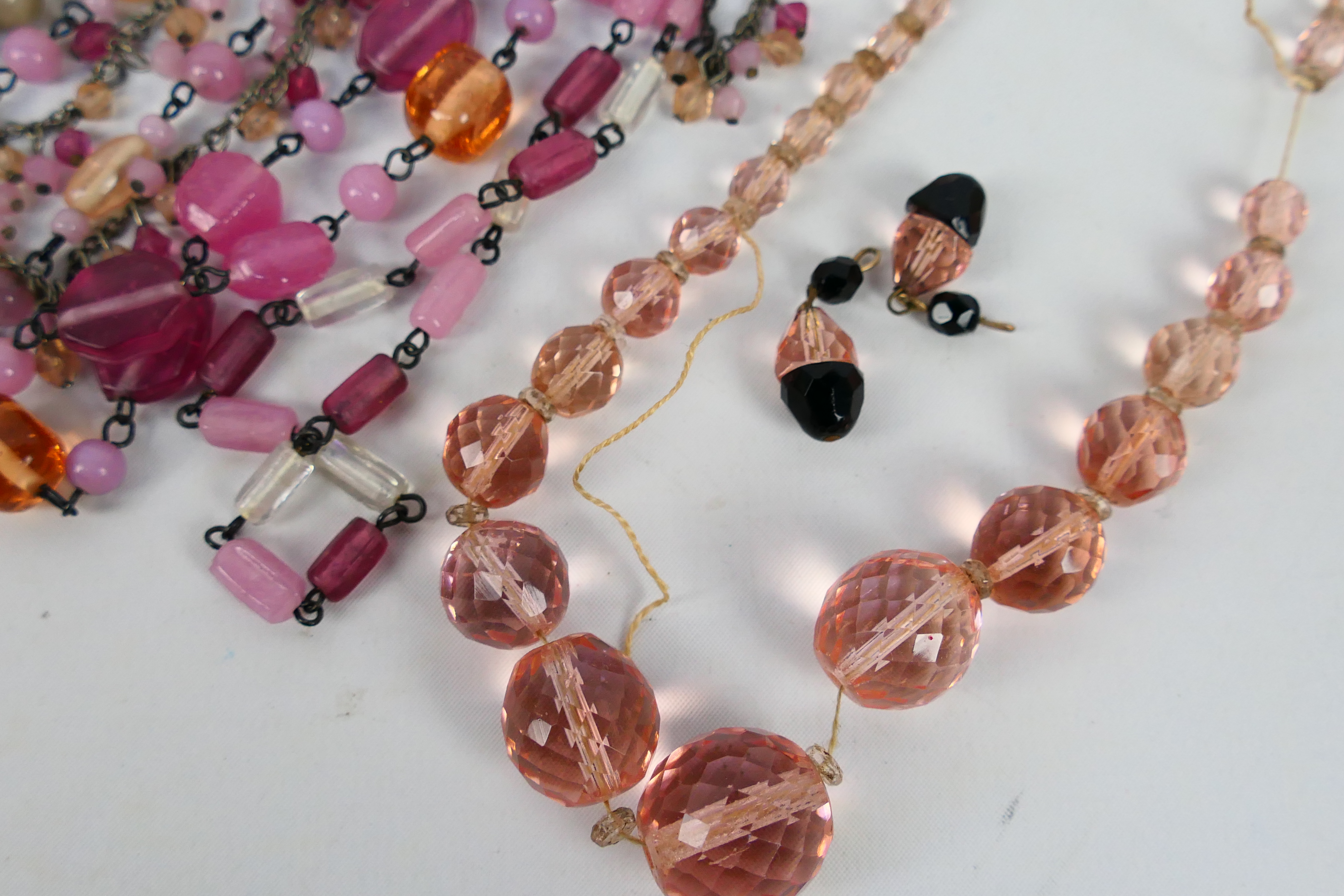 Three decorative costume jewellery necklaces and a pair of earrings. - Image 6 of 6