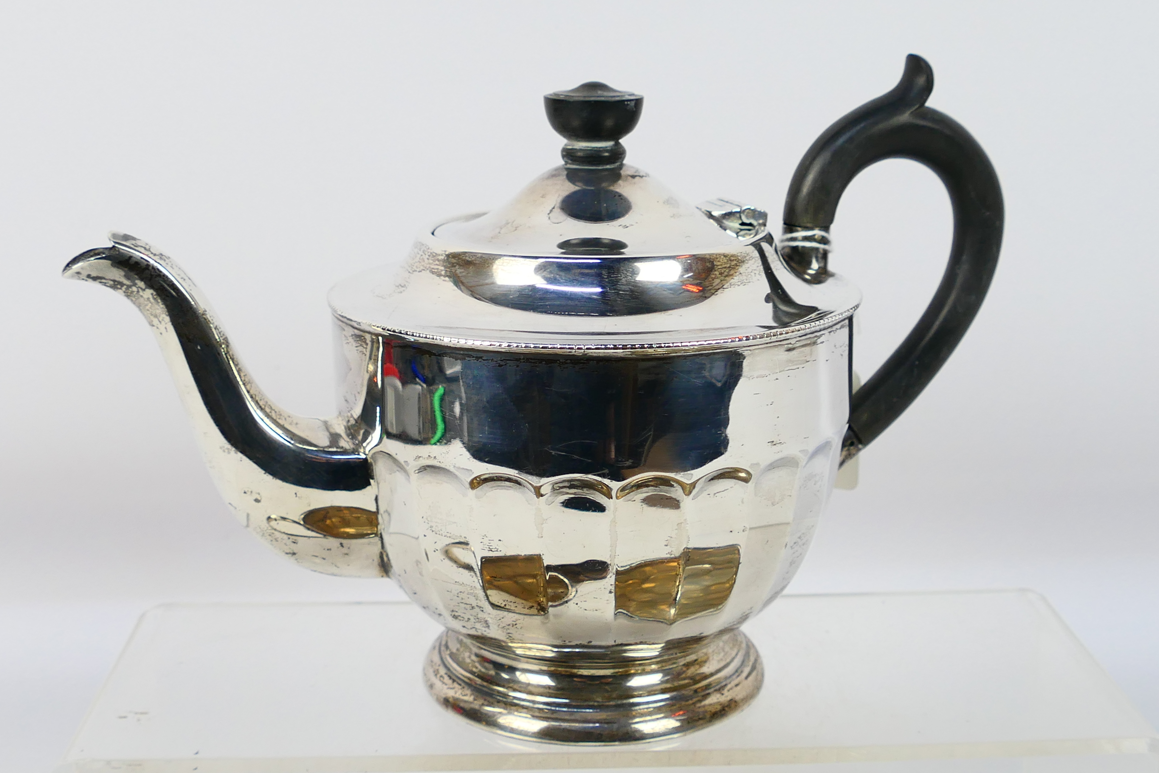 A silver tea service comprising teapot, sugar bowl and milk jug, Sheffield assay 1936, - Image 2 of 8
