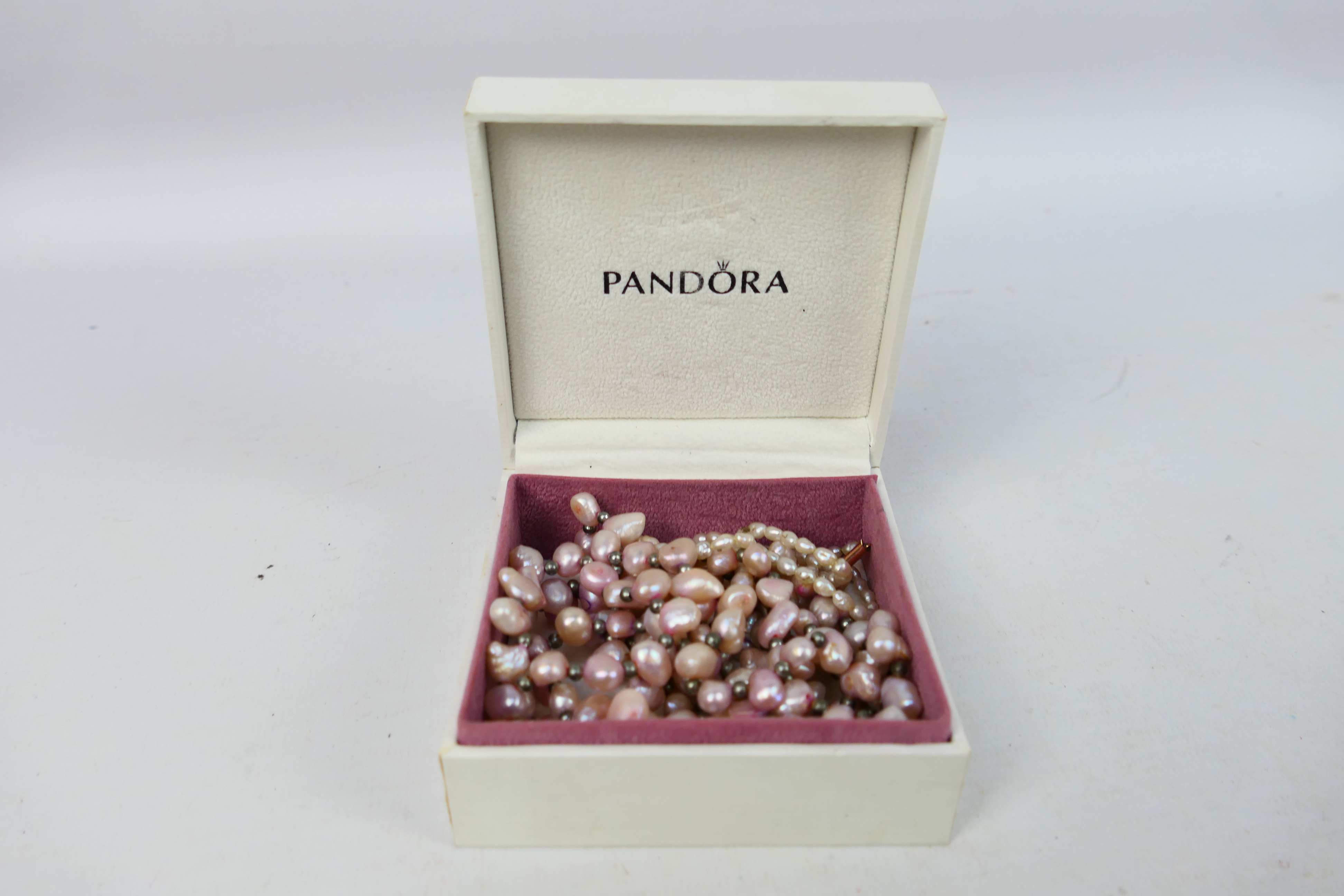 A rice pearl necklace with clasp stamped 9ct (in need of restringing) and a pearl bead three strand - Image 6 of 6