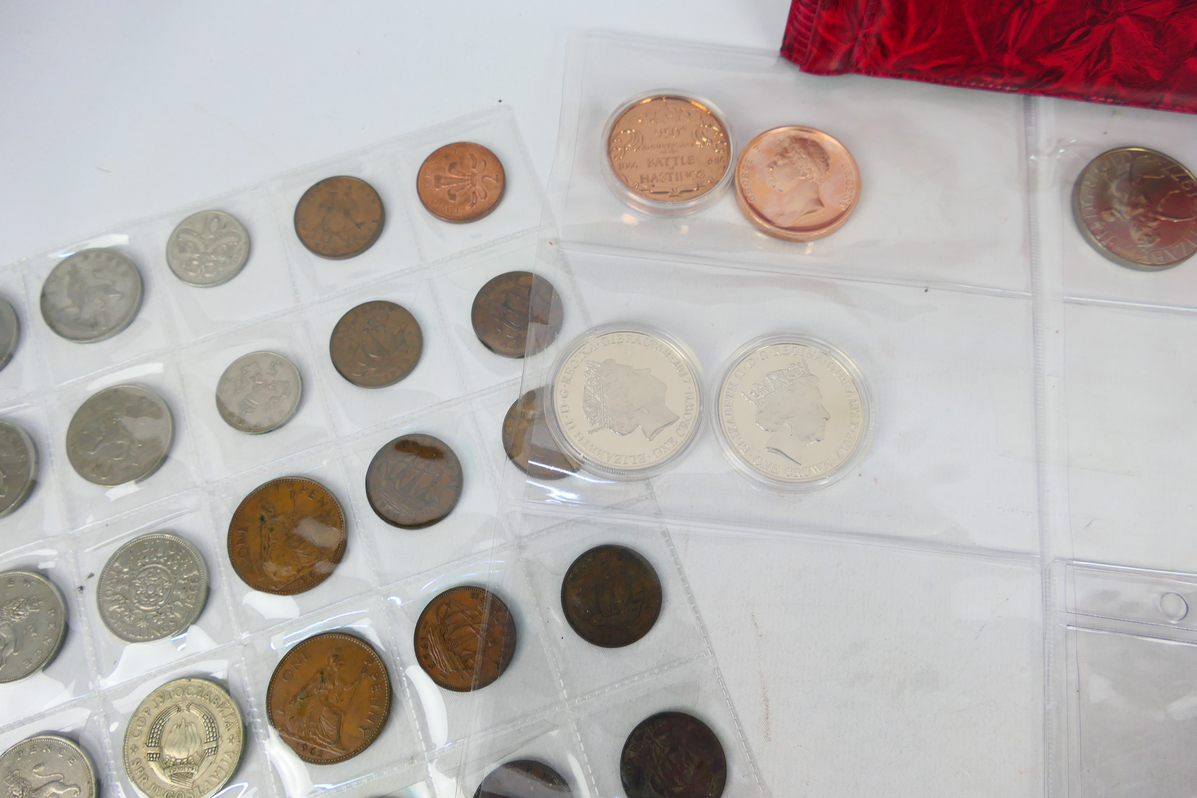 A collection of UK and foreign coins to include collectable fifty pence (50p) examples and other. - Image 3 of 10