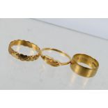 9ct Gold - Three 9ct yellow gold rings, various sizes, approximately 4.6 grams total.