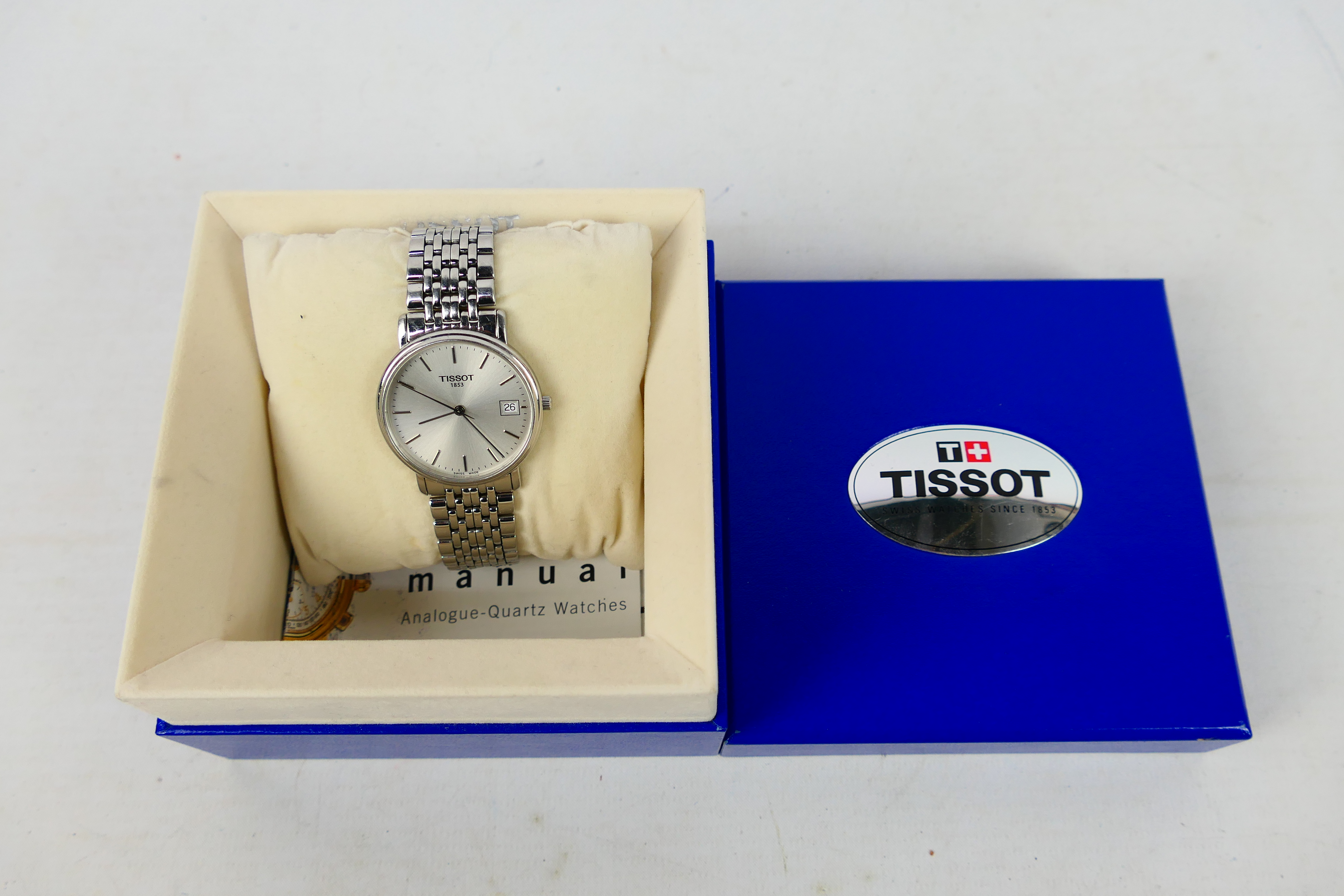 A stainless steel Tissot wrist watch contained in original box with paperwork.