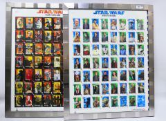 Star Wars - Two limited edition, framed display pieces of Cartamundi uncut playing card sheets,