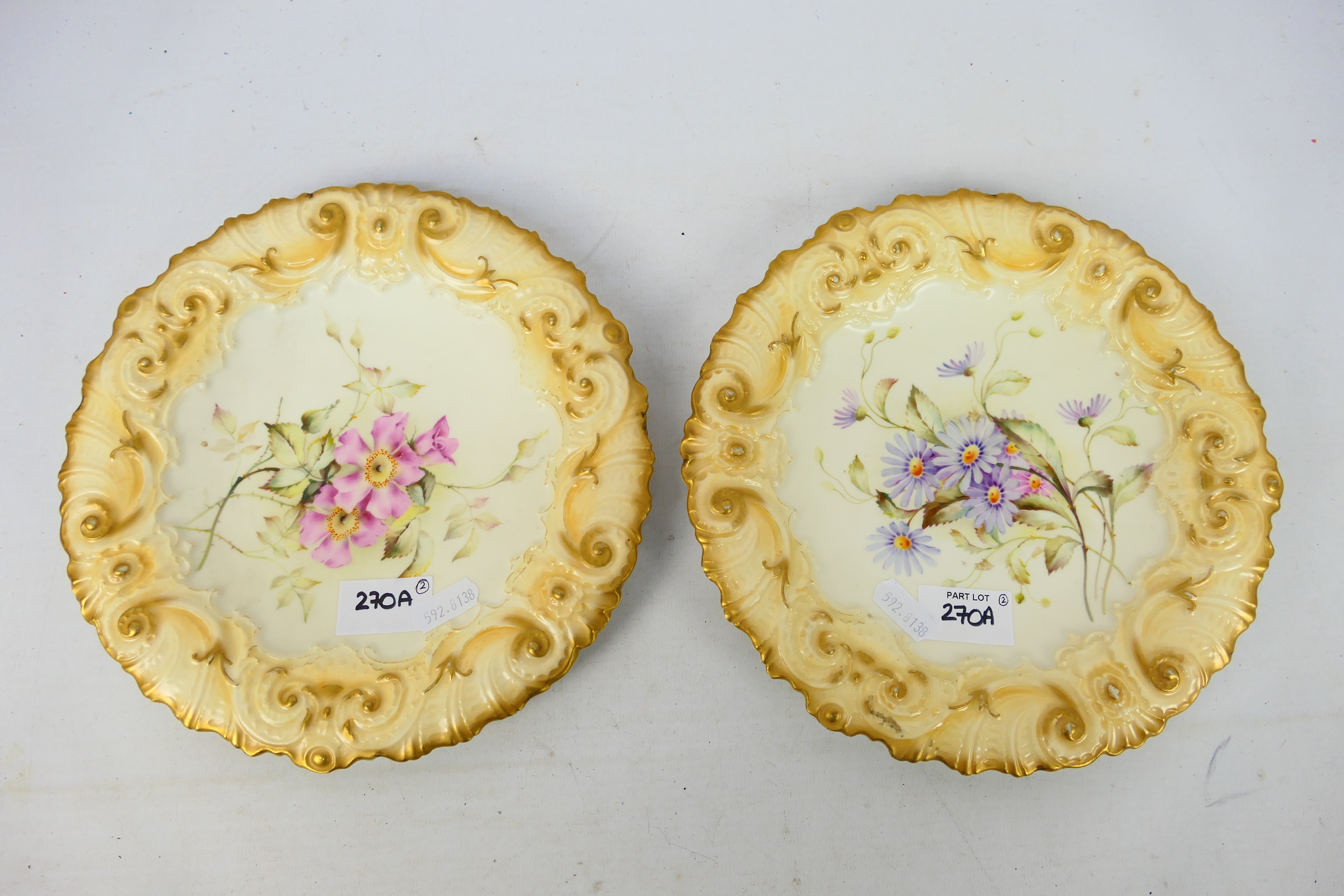 A pair of late 19th century Royal Worcester cabinet plates,